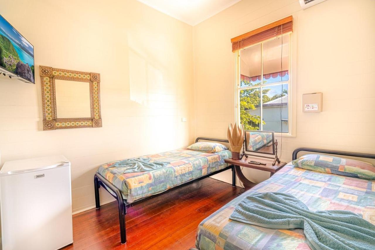 بيت شباب Travellers Oasis كيرنز المظهر الخارجي الصورة A typical room at the backpacker's